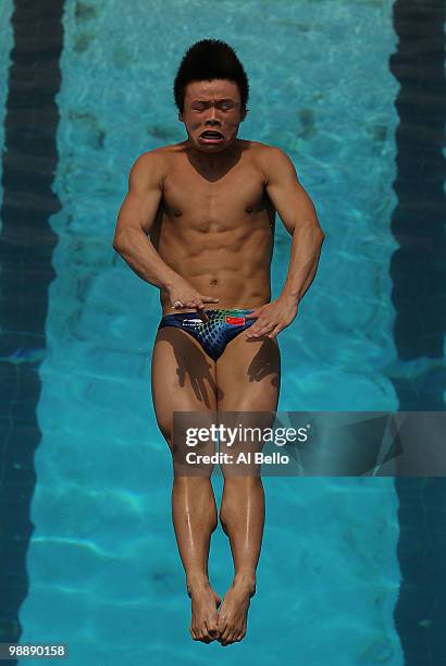 He Min of China dives during 3 meter springboard preliminaries at the Fort Lauderdale Aquatic Center during Day 1 of the AT&T USA Diving Grand Prix...