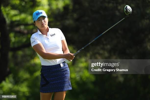 Jin Young Ko of Korea watches her drive on the second hole during the final round of the 2018 KPMG PGA Championship at Kemper Lakes Golf Club on July...