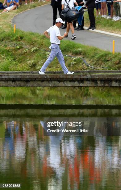 Justin Thomas of The USA putts walks off the 18th hole during day four of the HNA Open de France at Le Golf National on July 1, 2018 in Paris, France.