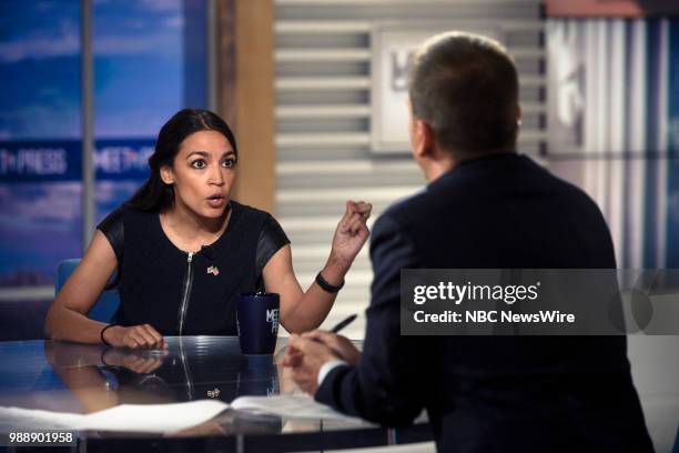 Pictured: Alexandria Ocasio-Cortez, Democratic Nominee for New York's 14th Congressional District, and moderator Chuck Todd appear on "Meet the...