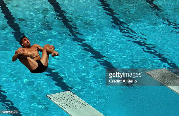 Javier Illana of Spain dives during 3 meter springboard preliminaries at the Fort Lauderdale Aquatic Center during Day 1 of the AT&T USA Diving Grand...
