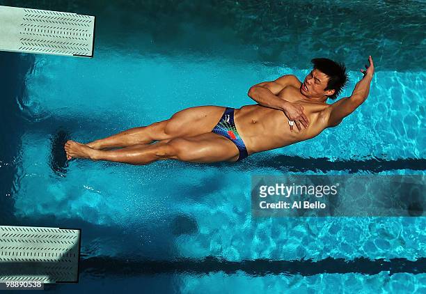 He Min of China dives during 3 meter springboard preliminaries at the Fort Lauderdale Aquatic Center during Day 1 of the AT&T USA Diving Grand Prix...