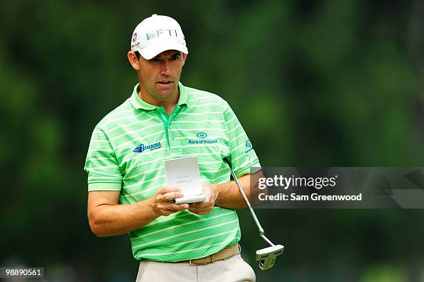 Padraig Harrington of Ireland looks at his yardage book on the sixth green during the first round of THE PLAYERS Championship held at THE PLAYERS...