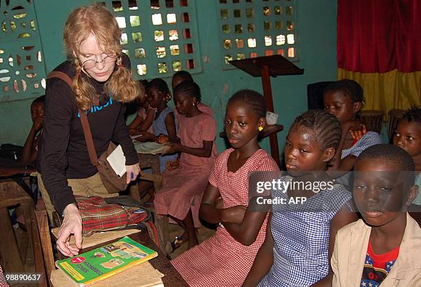 Actress Mia Farrow humanitarian and volunteer UNICEF Ambassador visits a school on May 6, 2010 in Conakry. Farrow is on a 5 day visit to Guinea...