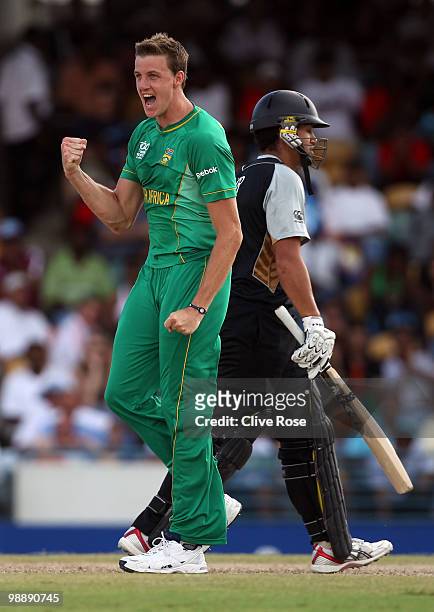 Morne Morkel of South Africa celebrates the wicket of Ross Taylor of New Zealand during The ICC World Twenty20 Super Eight match between South Africa...