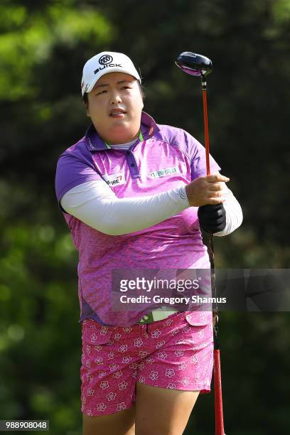 Shanshan Feng of China watches her drive on the second hole during the final round of the 2018 KPMG PGA Championship at Kemper Lakes Golf Club on...