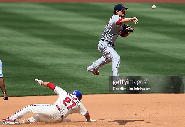 Placido Polanco of the Philadelphia Phillies is forced out at second base as Tyler Greene of the St. Louis Cardinals attempts a fourth inning double...