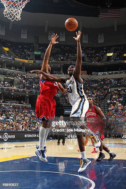 Zach Randolph of the Memphis Grizzlies shoots a layup against Rodney Carney of the Philadelphia 76ers during the game at the FedExForum on April 10,...