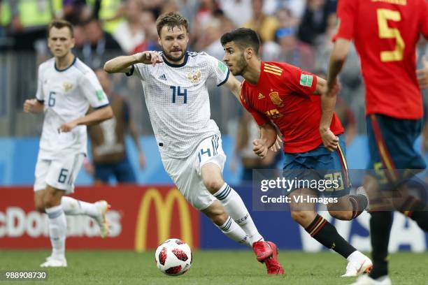 Vladimir Granat of Russia, Marco Asensio of Spain during the 2018 FIFA World Cup Russia round of 16 match between Spain and Russia at the Luzhniki...