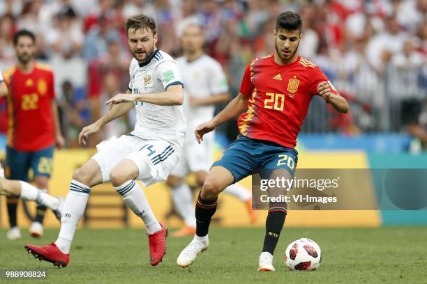 Vladimir Granat of Russia, Marco Asensio of Spain during the 2018 FIFA World Cup Russia round of 16 match between Spain and Russia at the Luzhniki...