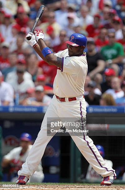 Ryan Howard of the Philadelphia Phillies follows through on a two run second inning single against the St. Louis Cardinals at Citizens Bank Park on...