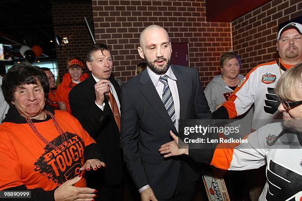 Injured Ian Laperriere of the Philadelphia Flyers is cheered by some fans prior to the start of his game against the Boston Bruins in Game Three of...