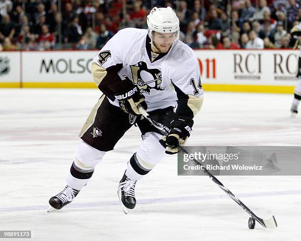 Chris Kunitz of the Pittsburgh Penguins skates with the puck in Game Three of the Eastern Conference Semifinals against the Montreal Canadiens during...