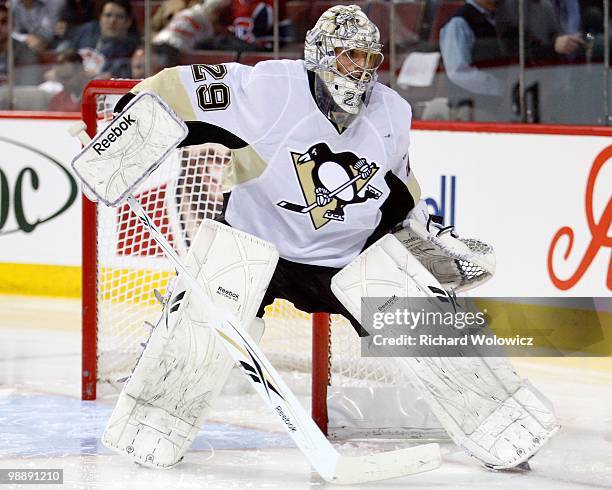 Marc-Andre Fleury of the Pittsburgh Penguins watches play in Game Three of the Eastern Conference Semifinals against the Montreal Canadiens during...