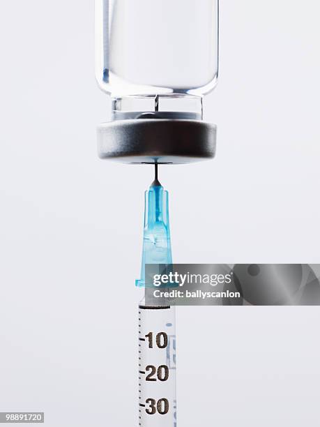 syringe with insulin bottle. - insulin stock pictures, royalty-free photos & images