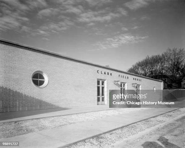 Exterior view of the Clark Field House, located at 919 Market Street in Burlington, IA, 1940. The building was a brick field house built into a...