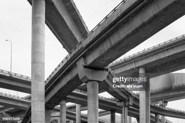 curved flyovers and multilane highways in chongqing,china - bridge low angle view stock pictures, royalty-free photos & images