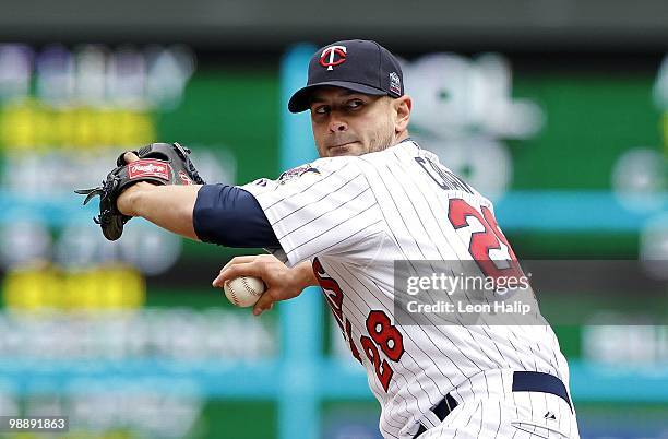 Jesse Crain of the Minnesota Twins pitches in the eighth inning during the game against the Detroit Tigers on May 5, 2010 at Target Field in...