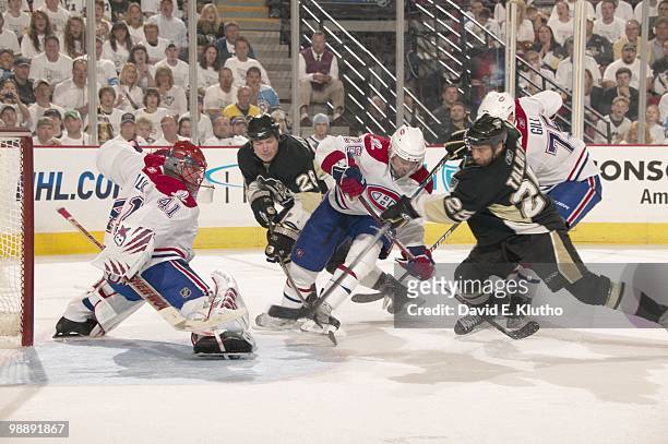 Montreal Canadiens goalie Jaroslav Halak and Josh Gorges in action vs Pittsburgh Penguins Ruslan Fedotenko and Maxime Talbot . Game 2. Pittsburgh, PA...