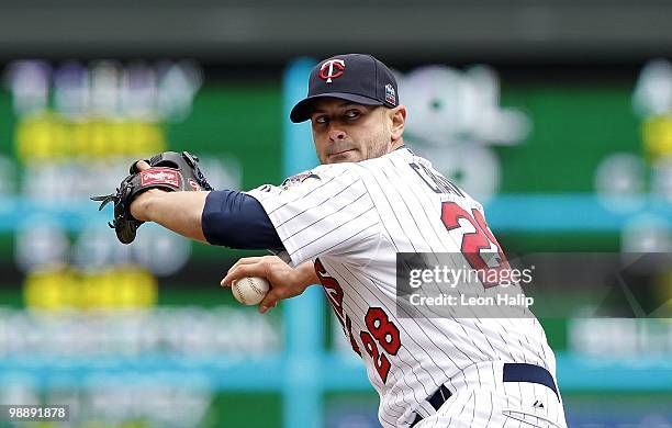 Jesse Crain of the Minnesota Twins pitches in the eighth inning during the game against the Detroit Tigers on May 5, 2010 at Target Field in...