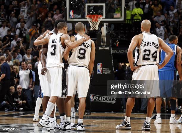 Antonio McDyess, George Hill, Tony Parker and Richard Jefferson of the San Antonio Spurs huddle on the court in Game Four of the Western Conference...