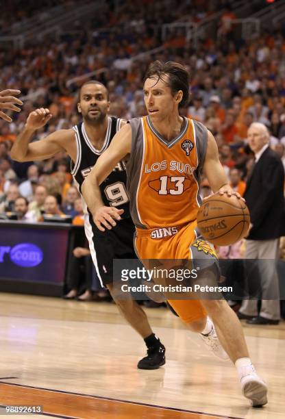 Steve Nash of the Phoenix Suns drives the ball past Tony Parker of the San Antonio Spurs during Game Two of the Western Conference Semifinals of the...