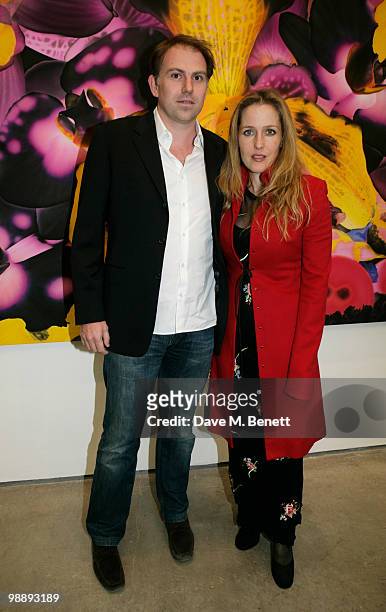 Gillian Anderson and Mark Griffiths attend the private view of 'Marc Quinn: Allanah, Buck, Catman, Chelsea, Michael, Pamela and Thomas', at the White...