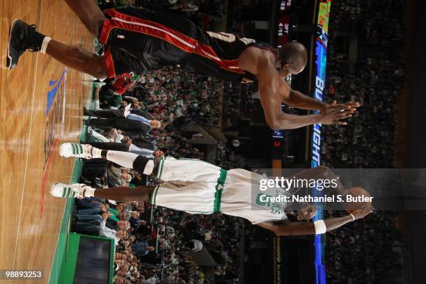 Kevin Garnett of the Boston Celtics shoots against Joel Anthony of the Miami Heat in Game Five of the Eastern Conference Quarterfinals during the...