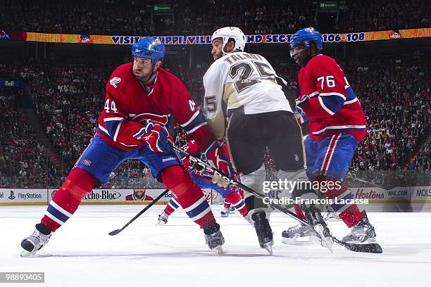 Maxime Talbot of the Pittsburgh Penguins waits for a pass in front of Roman Hamrlik of Montreal Canadiens in Game Three of the Eastern Conference...