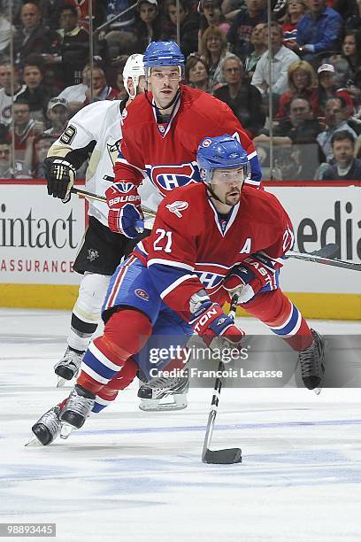Brian Gionta of Montreal Canadiens skates with the puck in Game Three of the Eastern Conference Semifinals against the Pittsburgh Penguins during the...