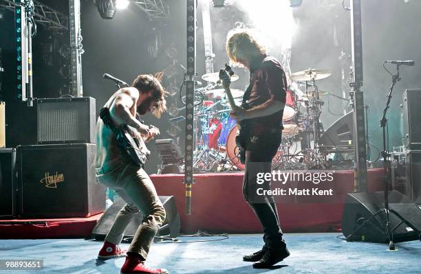 Simon Neil and James Johnston of Biffy Clyro perform at the Hammersmith Apollo on May 6, 2010 in London, England.