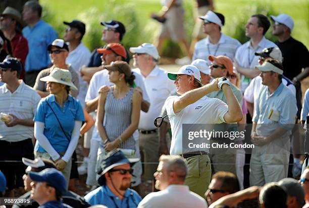 Ernie Els of South Africa watches a shot during the first round of THE PLAYERS Championship on THE PLAYERS Stadium Course at TPC Sawgrass on May 6,...