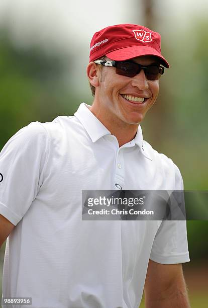 Ricky Barnes laughs on the driving range during the first round of THE PLAYERS Championship on THE PLAYERS Stadium Course at TPC Sawgrass on May 6,...