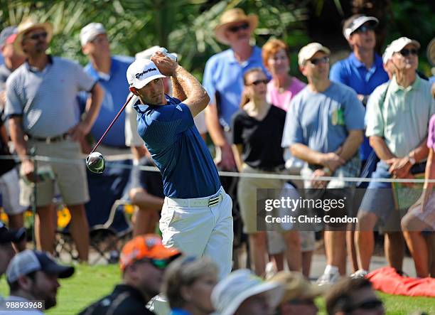 Dustin Johnson plays a shot during the first round of THE PLAYERS Championship on THE PLAYERS Stadium Course at TPC Sawgrass on May 6, 2010 in Ponte...