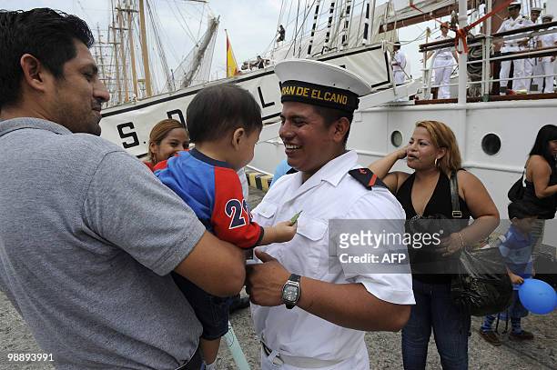 Ecuadorean Pedro mero , sailor aboard Spanish sailing ship Juan Sebastian De Elcano, meets with relatives upon arrival at the port of Guayaquil, May...