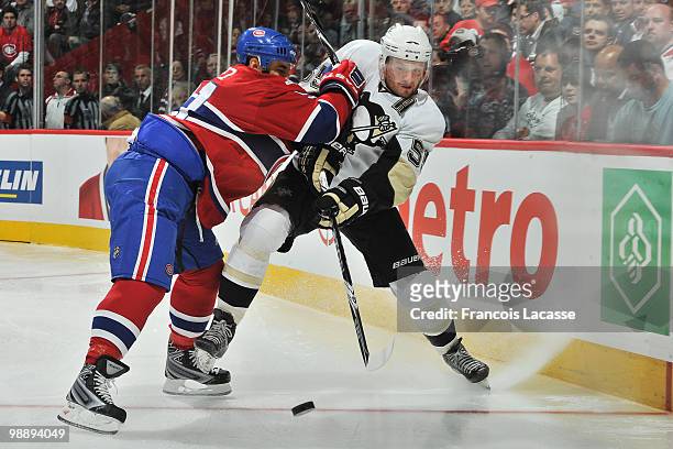 Scott Gomez of the Montreal Canadiens collides with Sergei Gonchar of the Pittsburgh Penguins in Game Four of the Eastern Conference Semifinals...