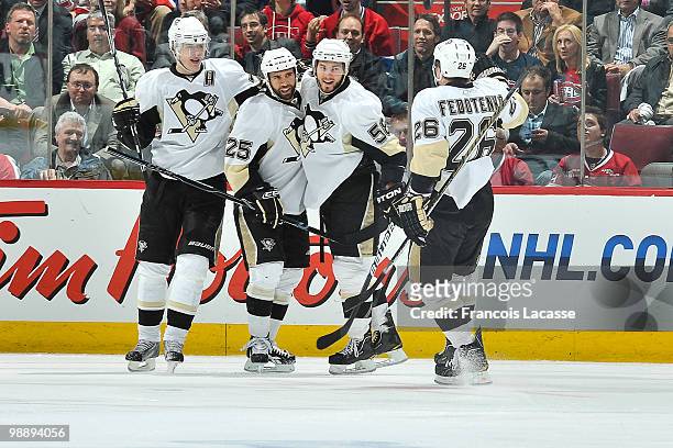 Kris Letang of the Pittsburgh Penguins celebrates a goal with teammate Maxime Talbot in Game Four of the Eastern Conference Semifinals against the...