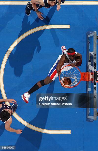 Kwame Brown of the Detroit Pistons makes a dunk against the Atlanta Hawks during the game at the Palace of Auburn Hills on April 7, 2010 in Auburn...