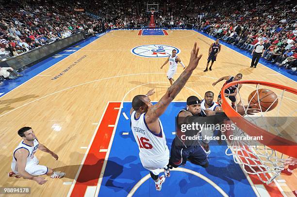 Josh Smith of the Atlanta Hawks puts a shot up against Marreese Speights of the Philadelphia 76ers during the game on March 26, 2010 at the Wachovia...