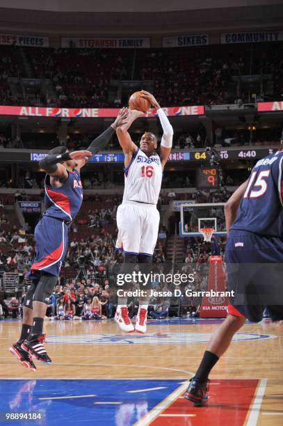 Marreese Speights of the Philadelphia 76ers puts a shot up against the Atlanta Hawks during the game on March 26, 2010 at the Wachovia Center in...