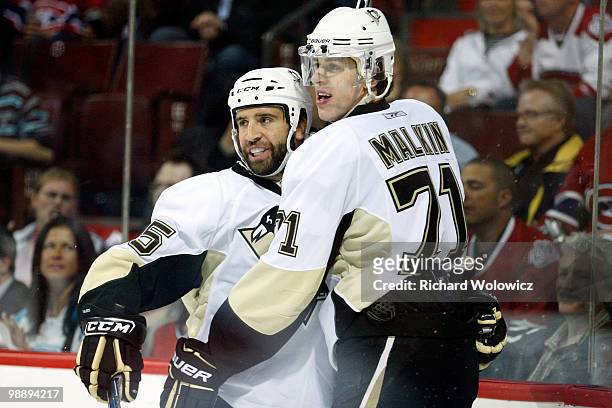 Maxime Talbot celebrates his first period goal with Evgeni Malkin of the Pittsburgh Penguins in Game Four of the Eastern Conference Semifinals...