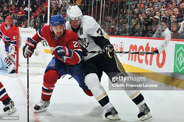 Josh Gorges of the Montreal Canadiens collides with Evgeni Malkin of the Pittsburgh Penguins in Game Four of the Eastern Conference Semifinals during...