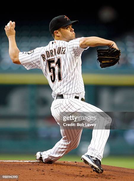 Pitcher Wandy Rodriguez of the Houston Astros throws in the first inning against the Arizona Diamondbacks at Minute Maid Park on May 6, 2010 in...