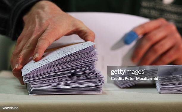 Ballot papers are counted in the constituency of Conservative Party leader David Cameron on May 7, 2010 in Witney, England. After 5 weeks of...