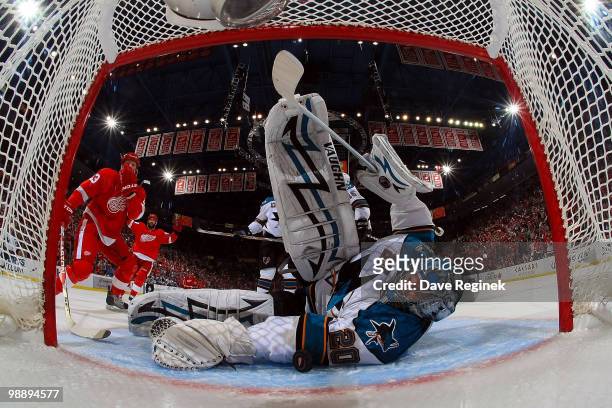Johan Franzen of the Detroit Red Wings celebrates a goal on Evgeni Nabokov of the San Jose Sharks during Game Four of the Western Conference...