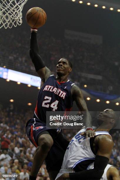 Marvin Williams of the Atlanta Hawks scores over Dwight Howard of the Orlando Magic in Game Two of the Eastern Conference Semifinals during the 2010...