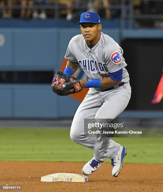 Addison Russell of the Chicago Cubs makes a play in the game against the Los Angeles Dodgers at Dodger Stadium on June 27, 2018 in Los Angeles,...