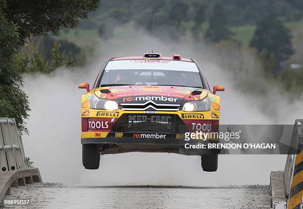 Petter Solberg world rally team in a Citroen C4, driver Petter Solberg of Norway and co-driver Phil Mills of Britain are air born during day 1 of the...
