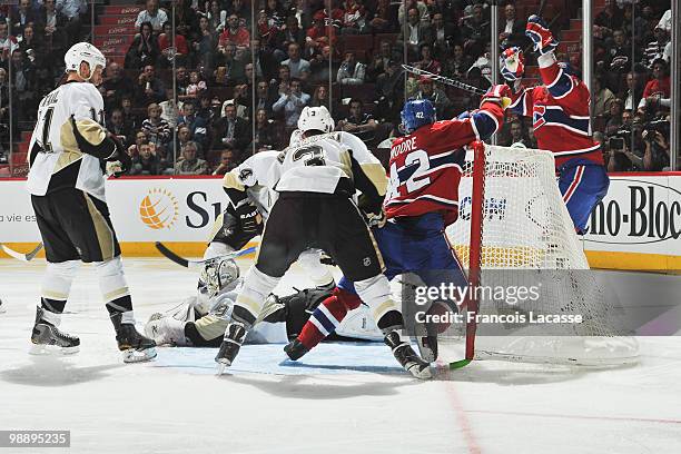 Dominic Moore of the Montreal Canadiens and teammate Maxim Lapierre celebrate a goal in Game Four of the Eastern Conference Semifinals against the...