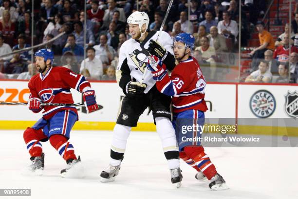 Josh Gorges of the Montreal Canadiens defends against Jordan Staal of the Pittsburgh Penguins in Game Four of the Eastern Conference Semifinals...